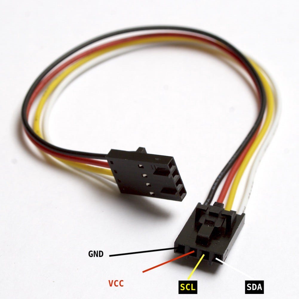 Four-wire I2C connector labelled GND, VCC, SCL and SDA