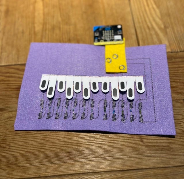 An E-textile piano made with a Bernina embroidery machine.