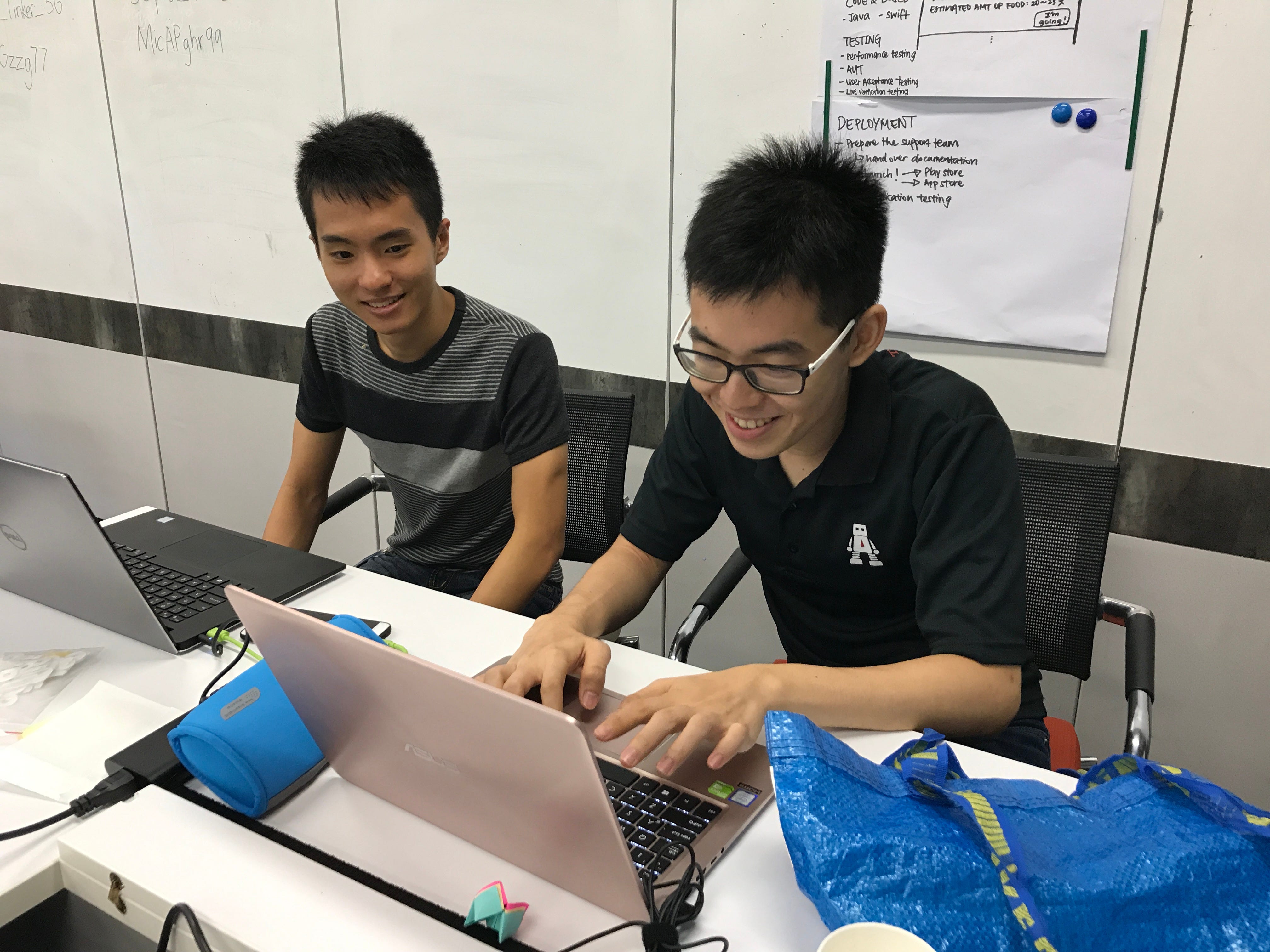 The brains behind the operation, our interns Wei Heng (left) and Si Jie (right)