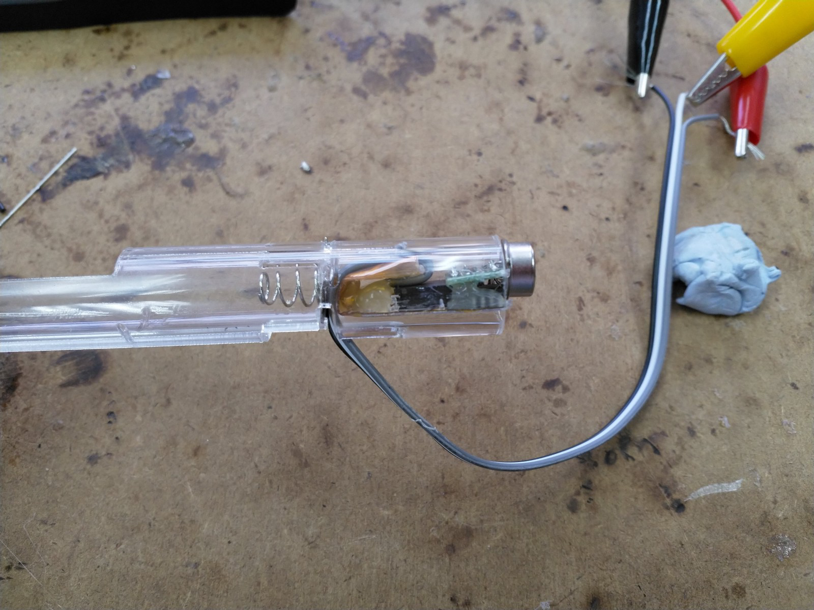 Flexible circuit and wires fitted inside a transparent tube for testing