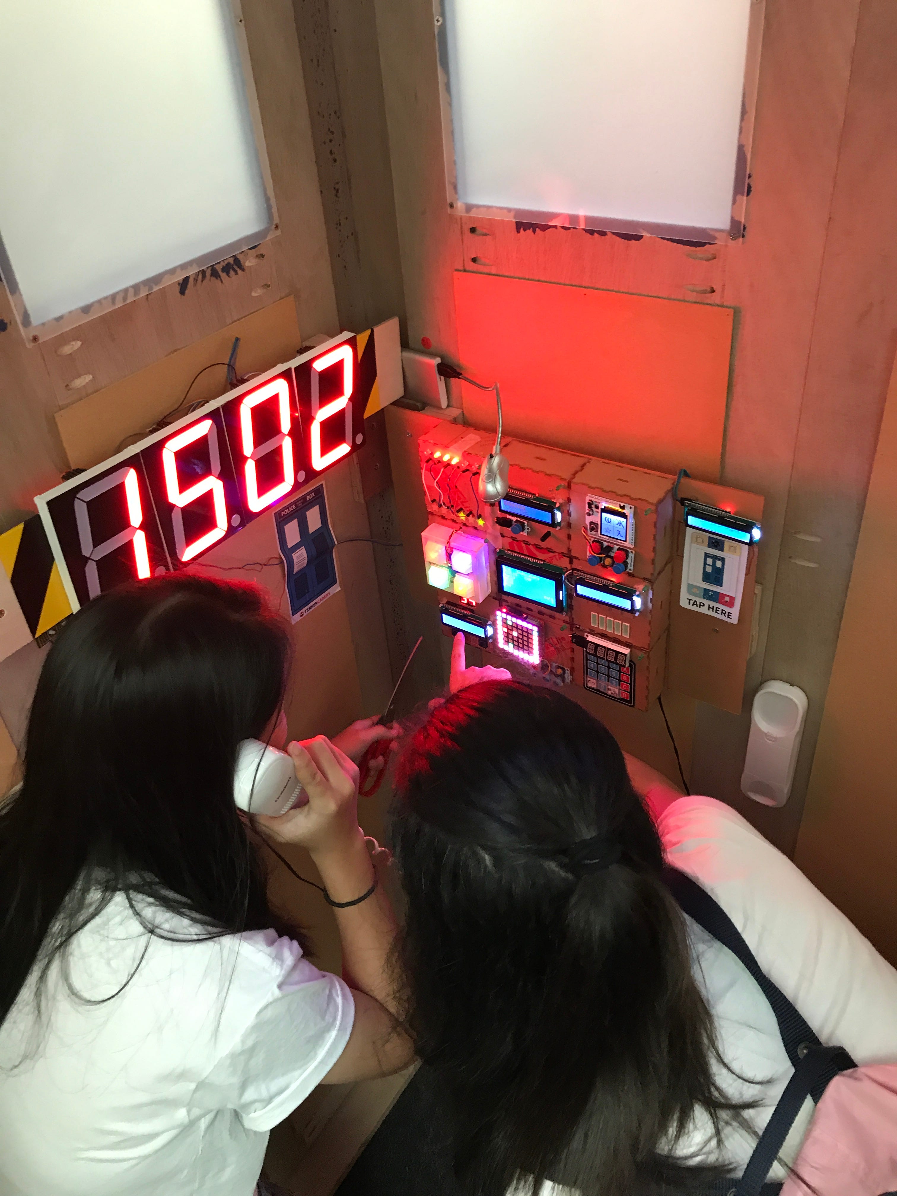 Use an actual phone to communicate with your bomb expert outside the phone booth