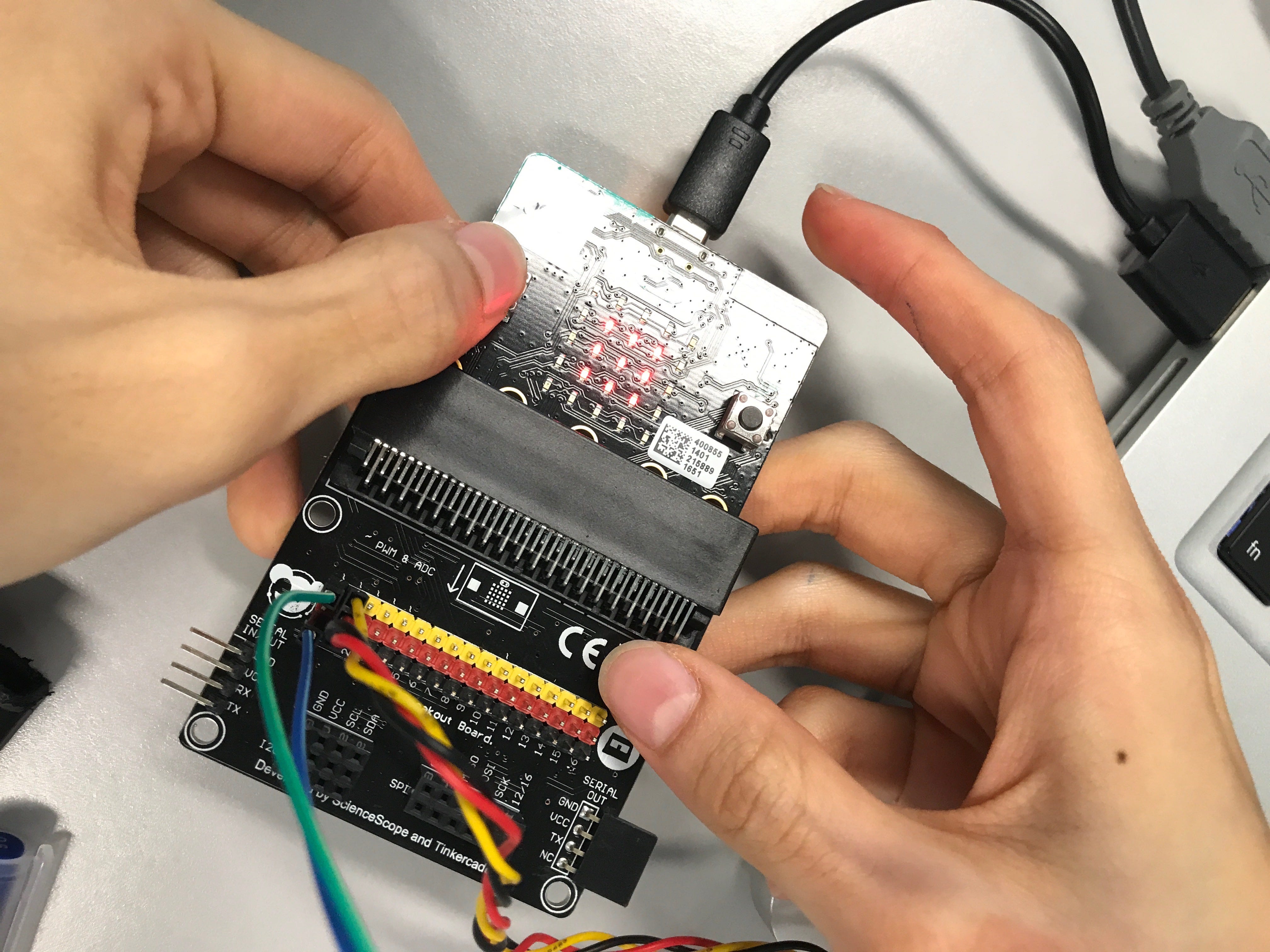 A student showing me her micro:bit project