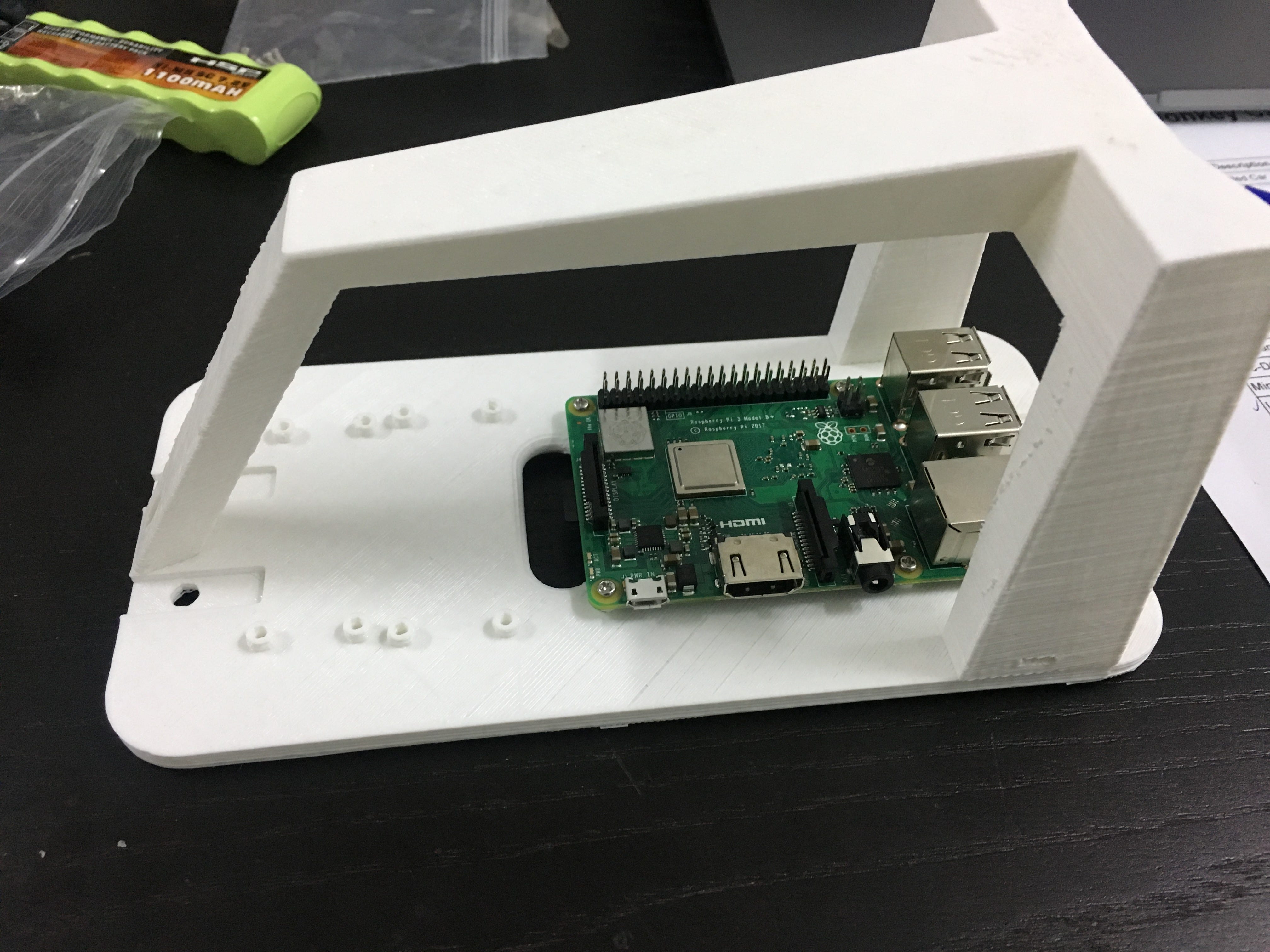 Raspberry Pi mounted on the white DonkeyCar chassis