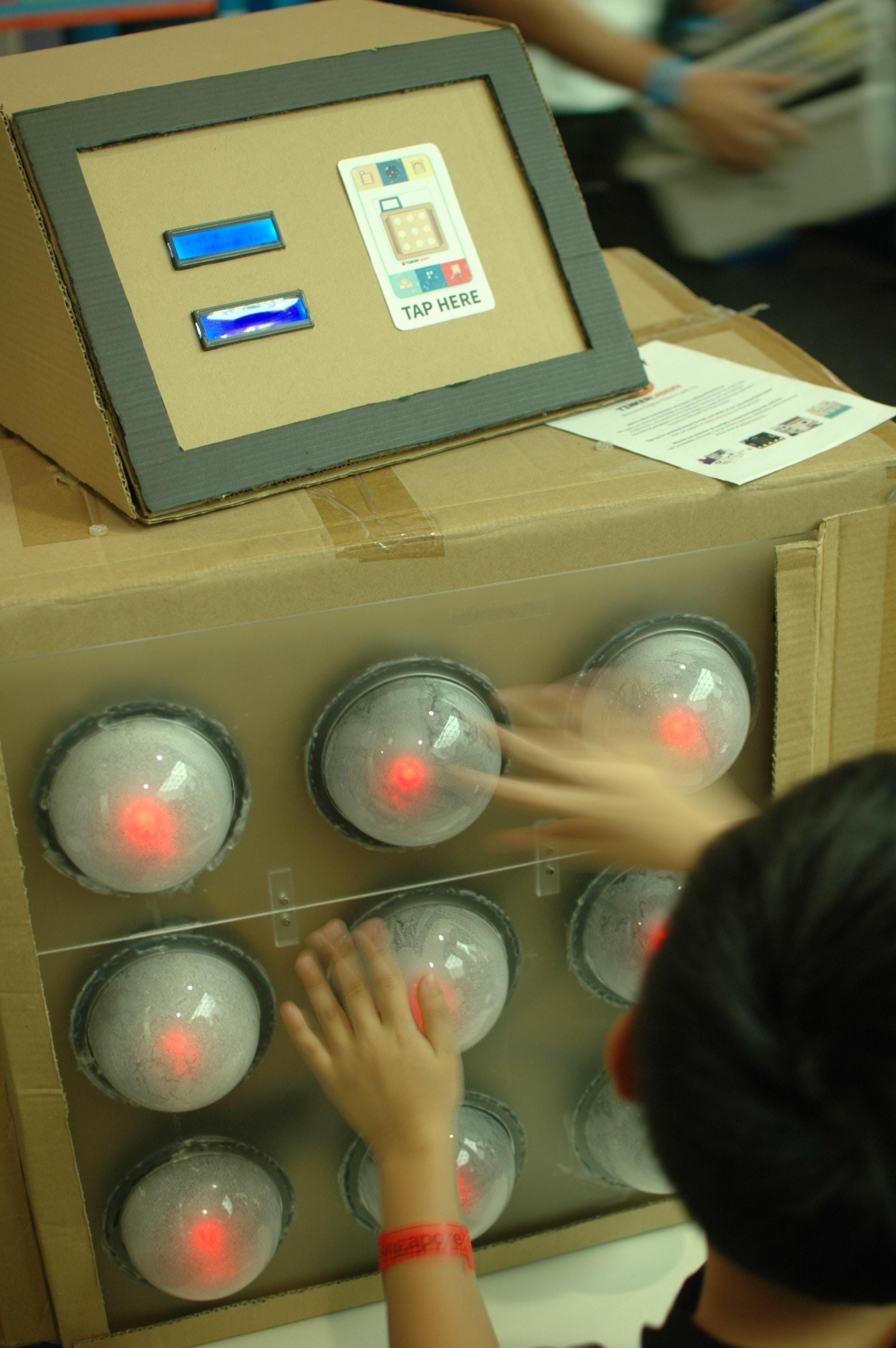 whack whack whack — buttons that are actually fake security cameras